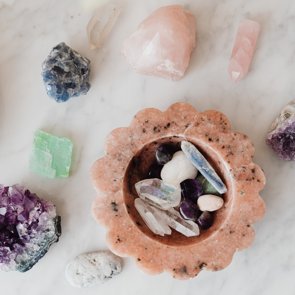 healing crystals spread out on table